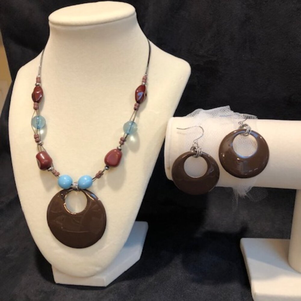 Necklace with brown, blue and burgundy beads plus earrings to match.